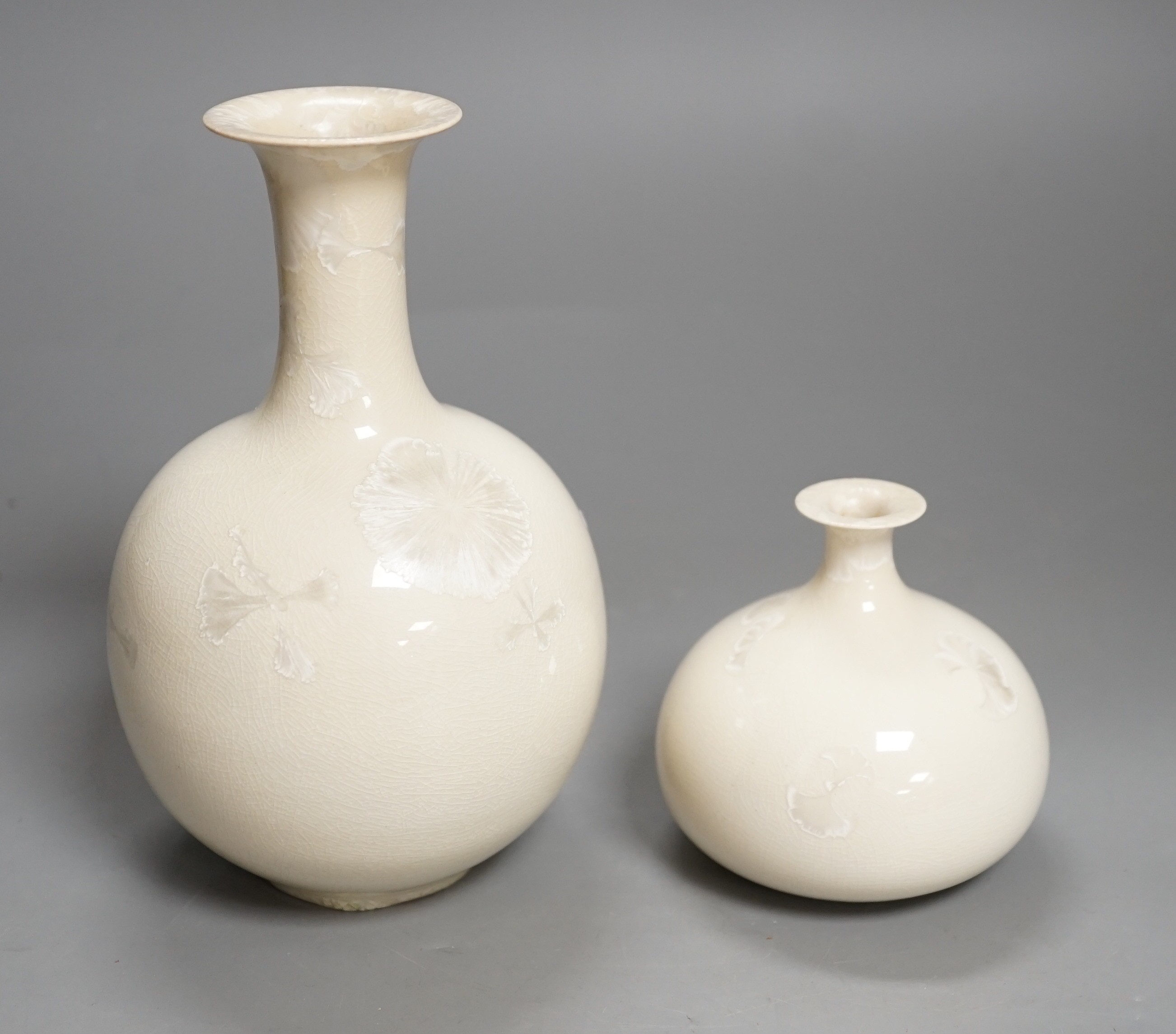 Two studio pottery white glazed bottle shaped vases, incised makers marks Ulich ? Tallest 17cm